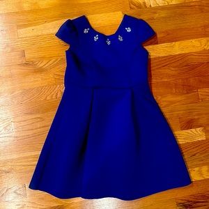 Royal blue formal dress for kid. Beautiful beading around the neckline.
